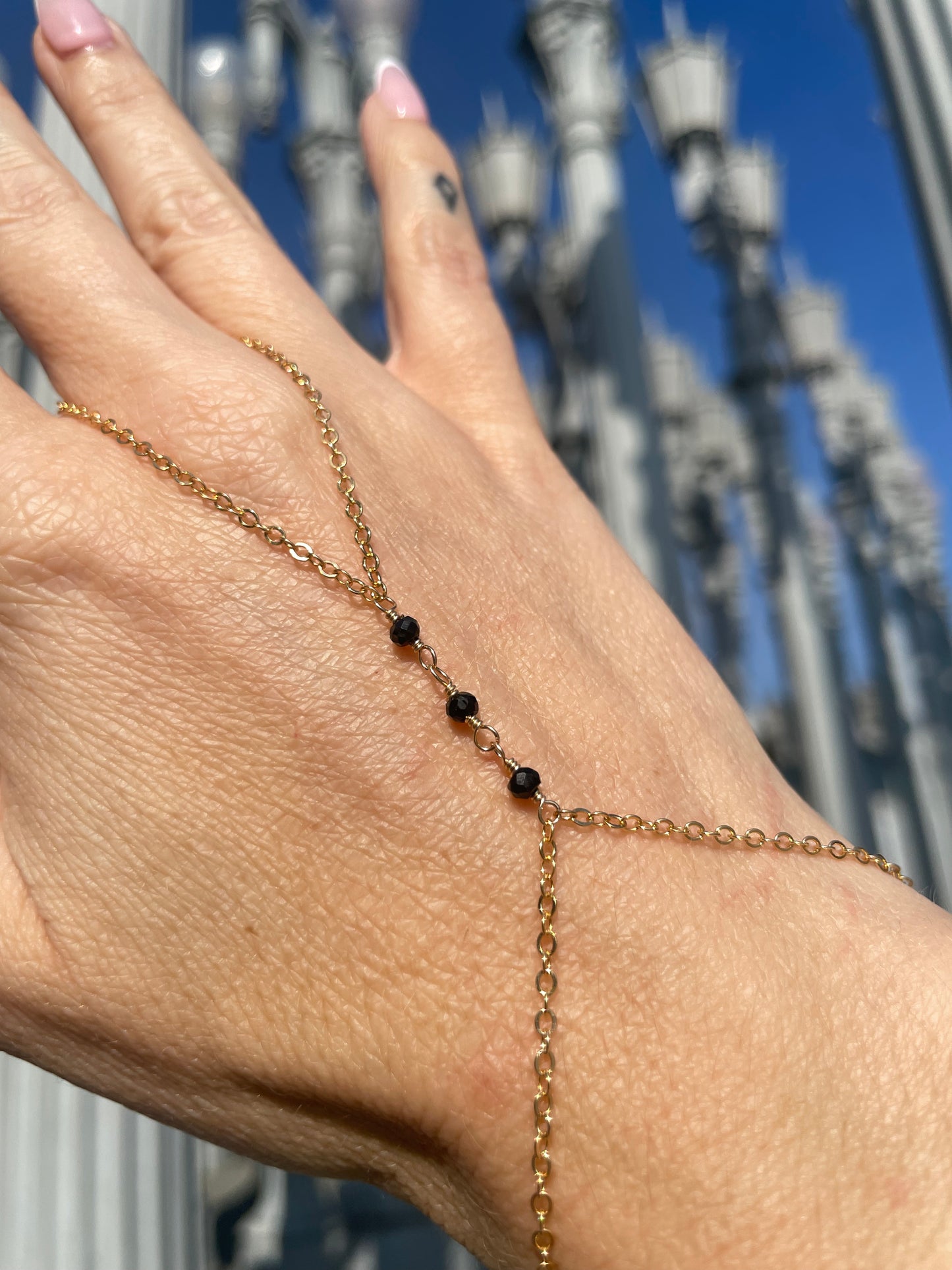 Black Spinel Wrapped Gold Hand Chain