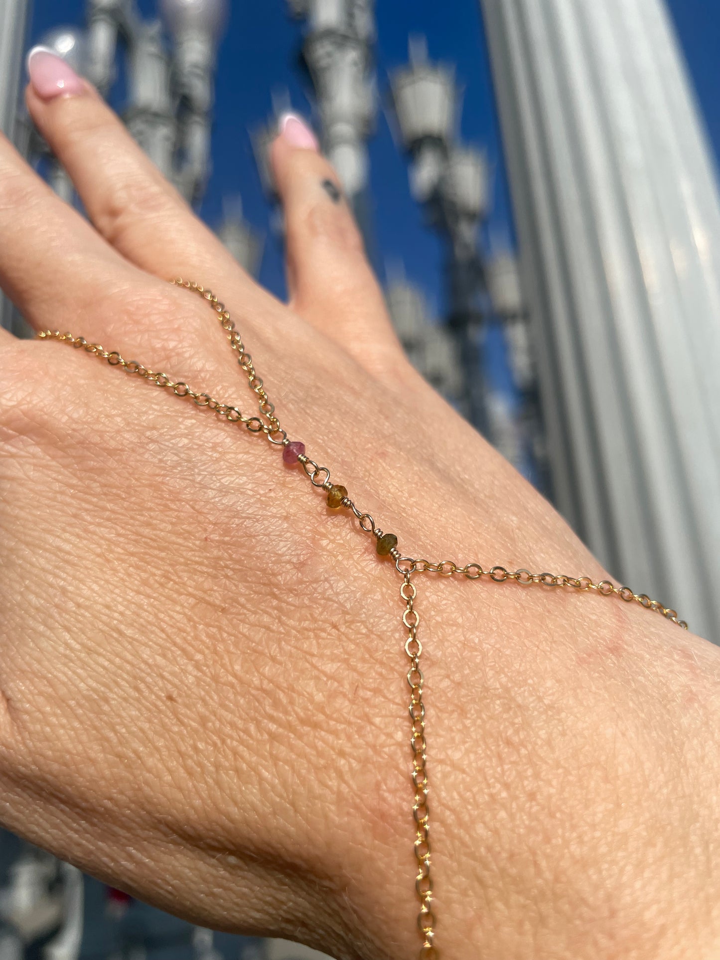 Tourmaline Wrapped Gold Hand Chain